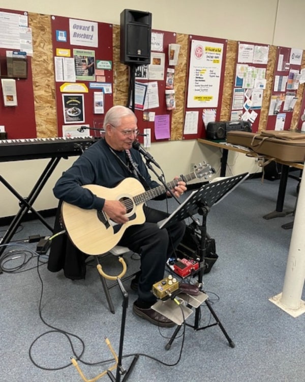 A Volunteer Playing Music