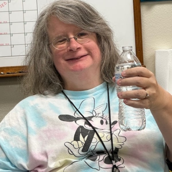 A Smiling Volunteer Taking a Break